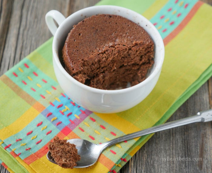Chocolate Mug Cake - takes minutes to make in the microwave. Gluten-free, Paleo-friendly. Recipe on myheartbeets.com