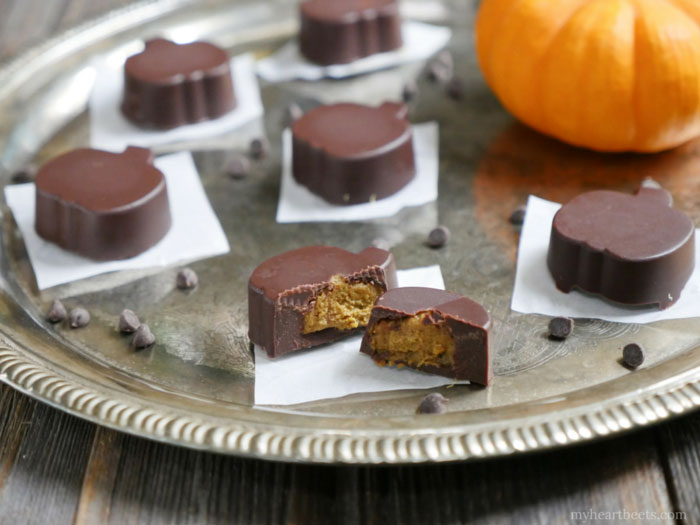 Chocolate Pumpkin Butter Cups made with a creamy spiced pumpkin sunbutter filling (dairy-free and paleo) by Ashley of MyHeartBeets.com