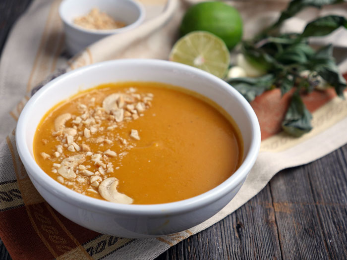 This Thai Butternut Squash Soup is a dairy-free and paleo-friendly recipe by Ashley of MyHeartBeets.com
