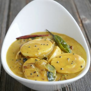 Kerala Egg Curry is a popular south Indian dish made by adding hard-boiled eggs to a spiced coconut milk sauce. Recipe on myheartbeets.com