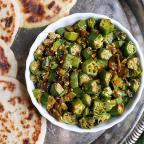 This crispy pan-fried okra is a popular Indian recipe also known as bhindi. It's a delicious way to eat okra! Recipe by Ashley of MyHeartBeets.com
