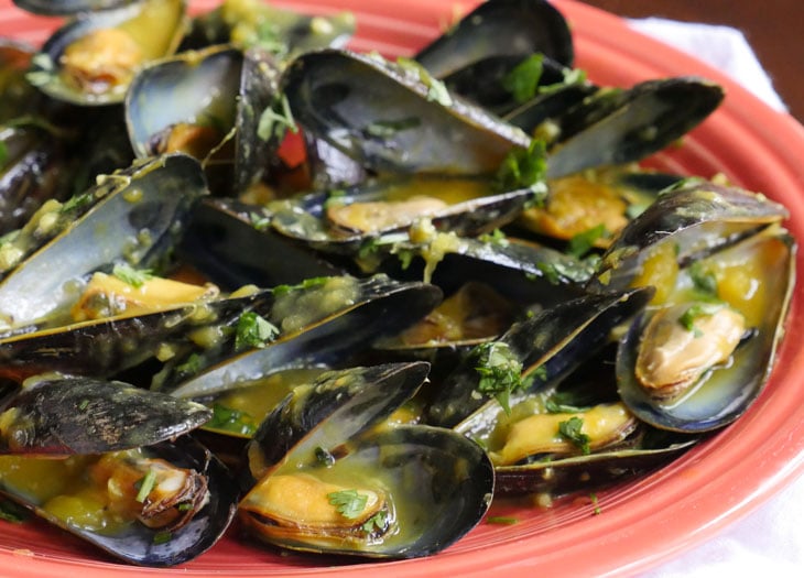 mussels in a mango and white wine sauce